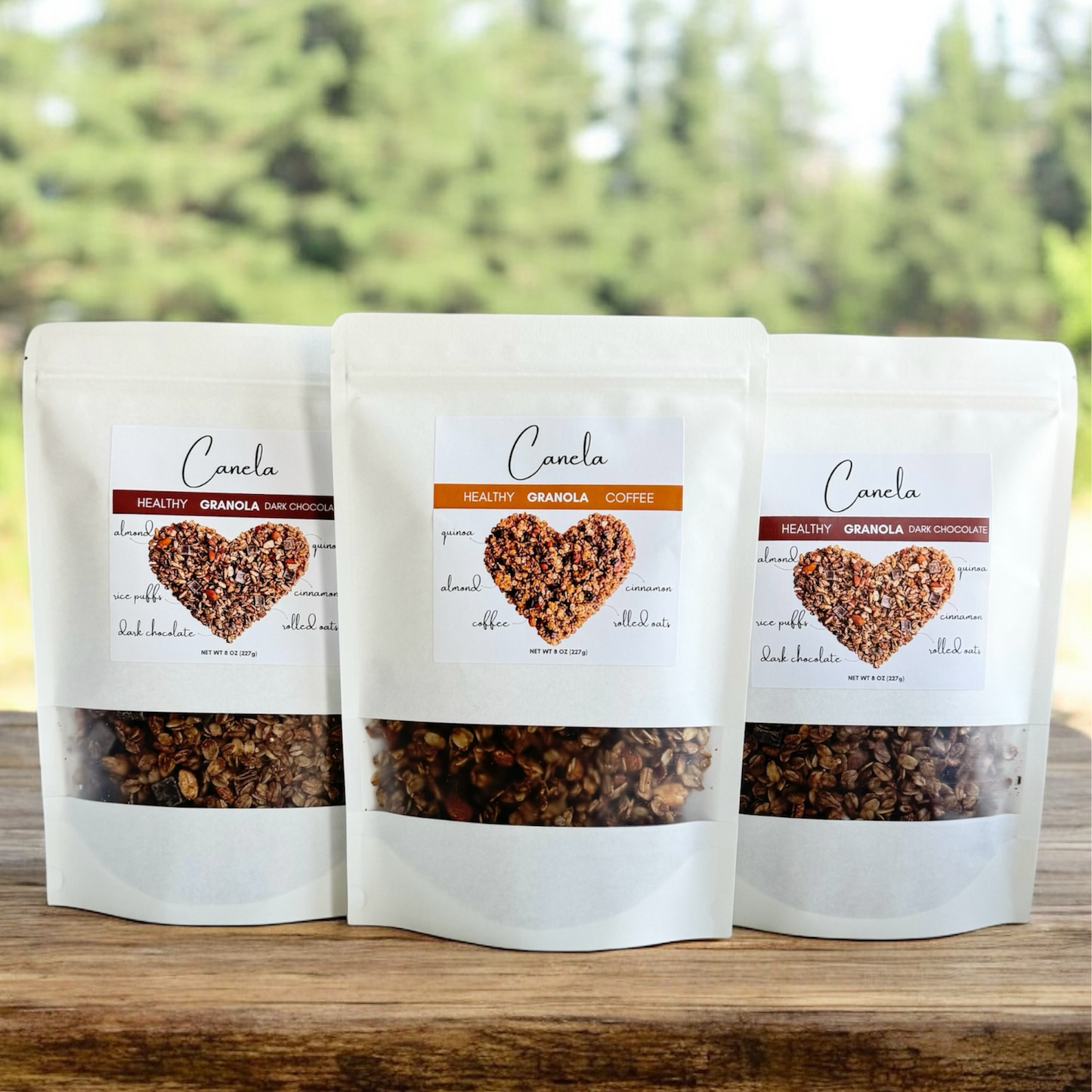 3 Bags of granola different flavors: 2 Dark chocolate and 1 Coffee.
