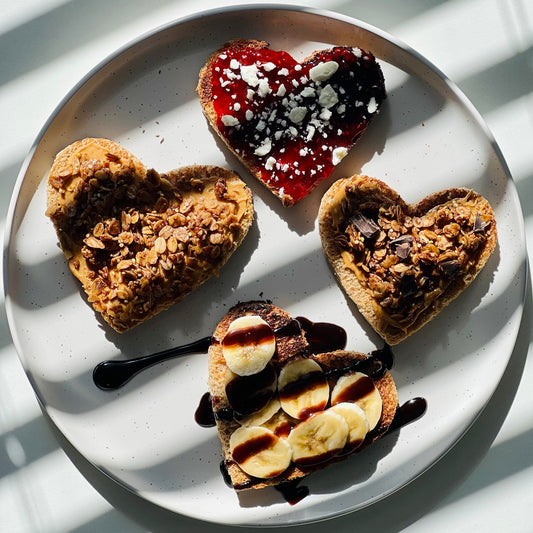 4 toasts with cream cheese and granola on top.  Flavors (Original, Dark chocolate, Caffee and Cacao)